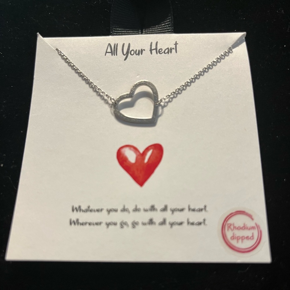 18" Silver heart necklace.  Great gift on card!

PRICE  DROP
